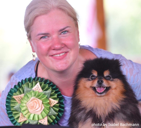 woman holding a dog